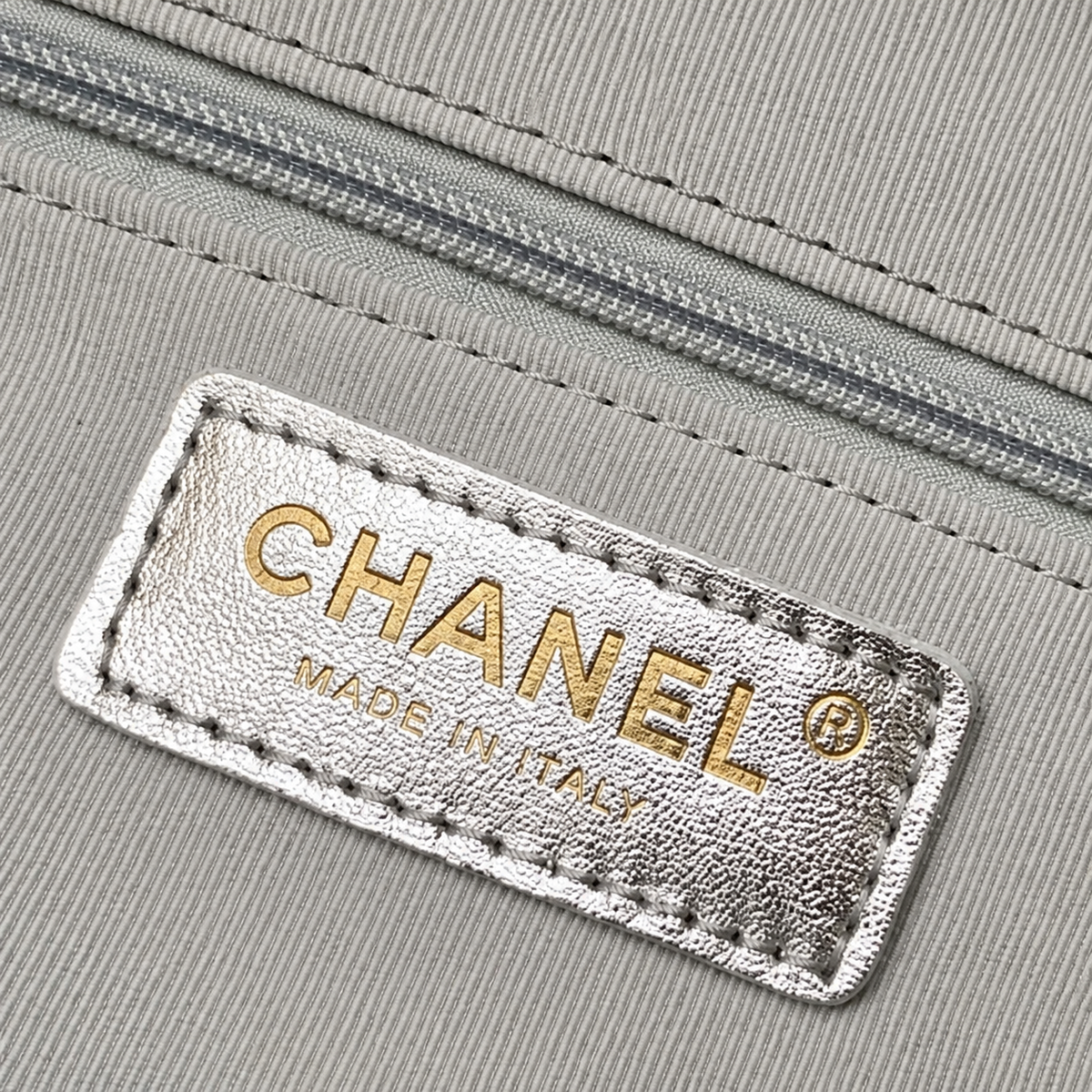 Chanel Quilted Mini Backpack in Silver Metallic Lambskin with Gold Chain
