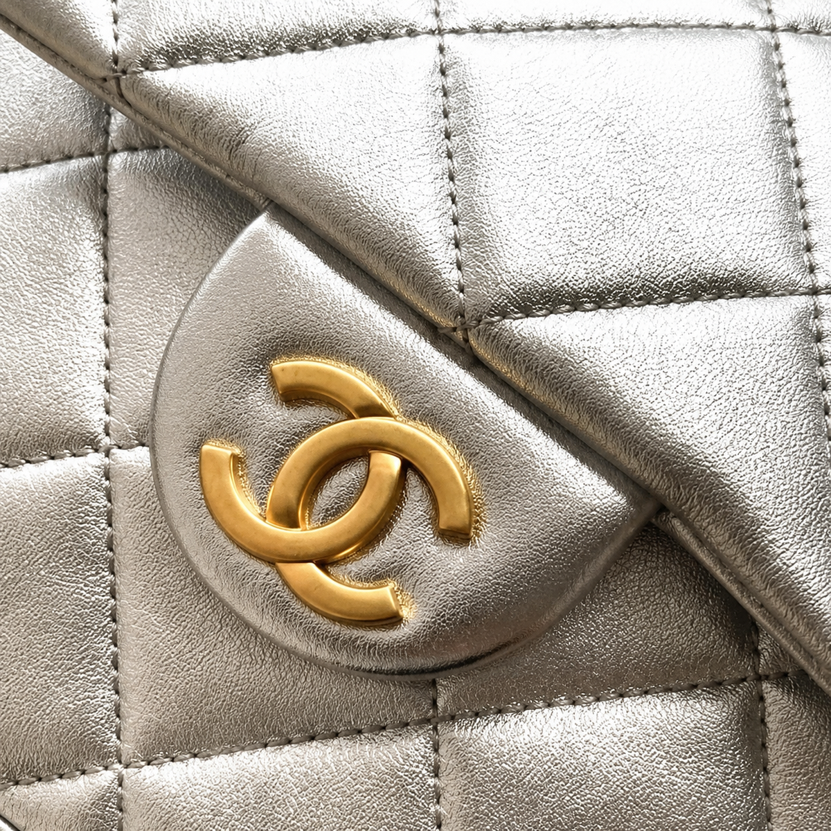 Chanel Quilted Mini Backpack in Silver Metallic Lambskin with Gold Chain