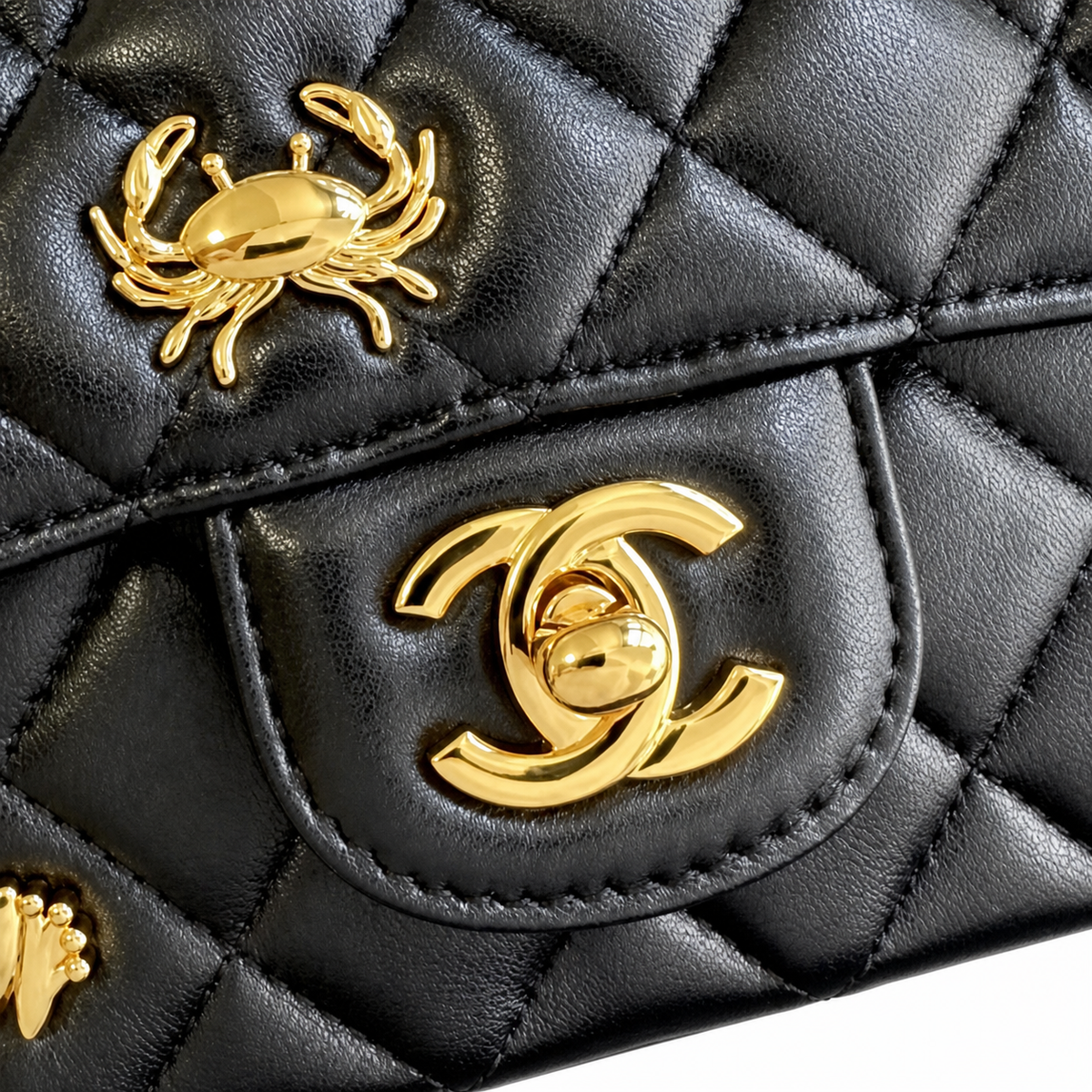 Chanel Black Quilted Charm Flap Bag
